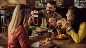 Friends enjoying a meal in a gastropub
